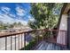 Balcony view of the complex and surrounding trees at 7755 E Quincy Ave # 303A3, Denver, CO 80237