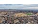 Neighborhood view with school, sports field, and distant city skyline at 7195 W 24Th Ave, Lakewood, CO 80214