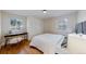 Spacious bedroom with wood floors and built-ins at 7195 W 24Th Ave, Lakewood, CO 80214