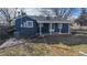 Rear view of house, showcasing the patio and landscaping at 7195 W 24Th Ave, Lakewood, CO 80214