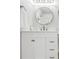 Bright bathroom with a modern vanity, updated fixtures, and decor at 709 S Wolcott Ct, Denver, CO 80219