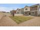 Spacious backyard features green grass and gravel at 4574 Walden St, Denver, CO 80249