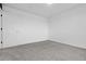 Bright, neutral bedroom with neutral carpeting and a large window at 4574 Walden St, Denver, CO 80249