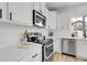A well-equipped kitchen featuring stainless steel appliances and sleek countertops for cooking enjoyment at 4574 Walden St, Denver, CO 80249