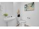 Clean powder room featuring modern fixtures and elegant decor at 4574 Walden St, Denver, CO 80249