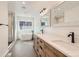 Spa-like bathroom with double vanity and a freestanding tub at 3916 N Mariposa St, Denver, CO 80211