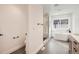 Clean bathroom with a toilet, shower, and bathtub at 3916 N Mariposa St, Denver, CO 80211