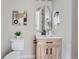 Small bathroom with modern vanity and a white toilet at 3916 N Mariposa St, Denver, CO 80211