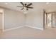 Well-lit bedroom with carpeted floors and ceiling fan at 3916 N Mariposa St, Denver, CO 80211