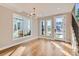 Bright dining room featuring hardwood floors and large windows at 3916 N Mariposa St, Denver, CO 80211