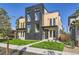 Modern two-unit building with dark brick and light wood accents at 3916 N Mariposa St, Denver, CO 80211