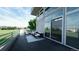 Relaxing balcony with comfortable seating, large windows, and scenic outdoor views at 7330 Centennial Dr, Parker, CO 80138