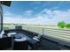 Outdoor deck features comfortable seating and overlooks a vast, open green space at 7330 Centennial Dr, Parker, CO 80138