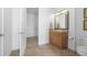 Well lit bathroom with a vanity, natural light, and ample storage space at 7330 Centennial Dr, Parker, CO 80138