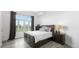 Bedroom with large window, wood-look flooring, and a king-size bed at 7330 Centennial Dr, Parker, CO 80138