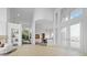 Open entryway with a view of the dining room, living room, and modern interior details at 7330 Centennial Dr, Parker, CO 80138