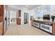 Bright kitchen with tile flooring, built in ovens, and granite countertops at 7330 Centennial Dr, Parker, CO 80138