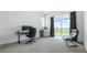 Bright office space with a desk, chair, and access to a large backyard patio at 7330 Centennial Dr, Parker, CO 80138
