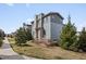 Well-maintained home featuring lush landscaping, mature trees and stone accents in a desirable neighborhood at 3368 Cranston Cir, Highlands Ranch, CO 80126