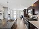Spacious kitchen with a large island, stainless steel appliances, and an open layout, perfect for entertaining at 3368 Cranston Cir, Highlands Ranch, CO 80126