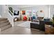 Inviting living room with ample seating, modern decor, and natural light, perfect for relaxation at 3368 Cranston Cir, Highlands Ranch, CO 80126