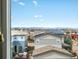 Scenic view of a neighborhood and mountains with visible solar panels at 3368 Cranston Cir, Highlands Ranch, CO 80126