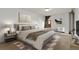 Serene main bedroom featuring a large bed, stylish decor, and natural light at 740 N Pearl St # 203, Denver, CO 80203