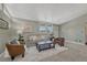 Comfortable living room featuring soft carpeting and stylish furnishings, creating a cozy atmosphere at 1906 S Vrain St, Denver, CO 80219