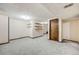 Finished basement with built-in shelving and extra storage at 5557 W 75Th Pl, Arvada, CO 80003