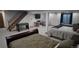 Finished basement offers sleeping and recreational space, complete with a foosball table and a crib at 16639 E Berry Ln, Centennial, CO 80015