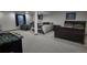 Spacious basement with multiple beds and entertainment area, perfect for guests or recreation at 16639 E Berry Ln, Centennial, CO 80015