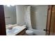 A functional bathroom with a standard tub/shower combo, toilet, and vanity with a sink at 16639 E Berry Ln, Centennial, CO 80015