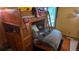 Cozy bunkbed bedroom with Ohio State Buckeyes decor, offering a fun and youthful atmosphere at 16639 E Berry Ln, Centennial, CO 80015