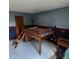 Bedroom with a raised bed, carpet flooring, and a window for natural light at 16639 E Berry Ln, Centennial, CO 80015