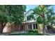 Charming brick home with a red front door and well-maintained front yard at 16639 E Berry Ln, Centennial, CO 80015