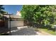 Spacious garage with a basketball hoop on the driveway at 16639 E Berry Ln, Centennial, CO 80015