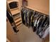 Walk-in closet with adjustable shelves and rods for organized storage at 16639 E Berry Ln, Centennial, CO 80015