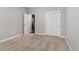 Neutral bedroom with carpet, a window, and closet for comfort and storage at 6835 Surrey Trl, Littleton, CO 80125