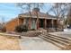 Brick community building featuring well-maintained landscaping and easy access to amenities at 11861 E Yale Ct, Aurora, CO 80014
