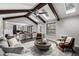 Open-concept living room features vaulted ceilings and seamless flow at 11861 E Yale Ct, Aurora, CO 80014