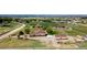 Expansive property featuring a ranch home, detached garage, and fenced pasture land with mountain views at 1851 E 138Th Ave, Brighton, CO 80602