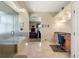 Elegant bathroom with soaking tub, glass shower, and vanity with granite countertop at 1851 E 138Th Ave, Brighton, CO 80602