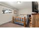 Rustic bedroom featuring a log bed frame and dresser with mountain style at 1851 E 138Th Ave, Brighton, CO 80602