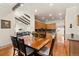 Eat-in kitchen with wood cabinets, granite countertops, and stainless steel appliances at 1851 E 138Th Ave, Brighton, CO 80602