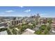 Beautiful cityscape view from a high vantage point, overlooking historic buildings and modern high rises with green foliage at 550 E 12Th Ave # 810, Denver, CO 80203