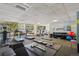 Well-equipped fitness center with treadmills, weights, and ample natural light, designed for a healthy lifestyle at 550 E 12Th Ave # 810, Denver, CO 80203