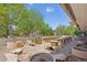 Community garden area with raised beds and seating at 550 E 12Th Ave # 810, Denver, CO 80203