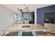 Contemporary kitchen with stylish gray cabinets, herringbone backsplash, and wood island at 550 E 12Th Ave # 810, Denver, CO 80203