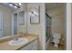 Bathroom features a walk-in shower and single sink vanity at 562 W Crestline Cir # 7D, Littleton, CO 80120