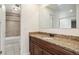 Elegant bathroom featuring granite countertops and tile details at 1233 S Yosemite Way # 74, Denver, CO 80247
